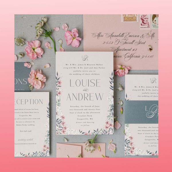 Summer wedding invitation suite with pink, white, and blue design with florals