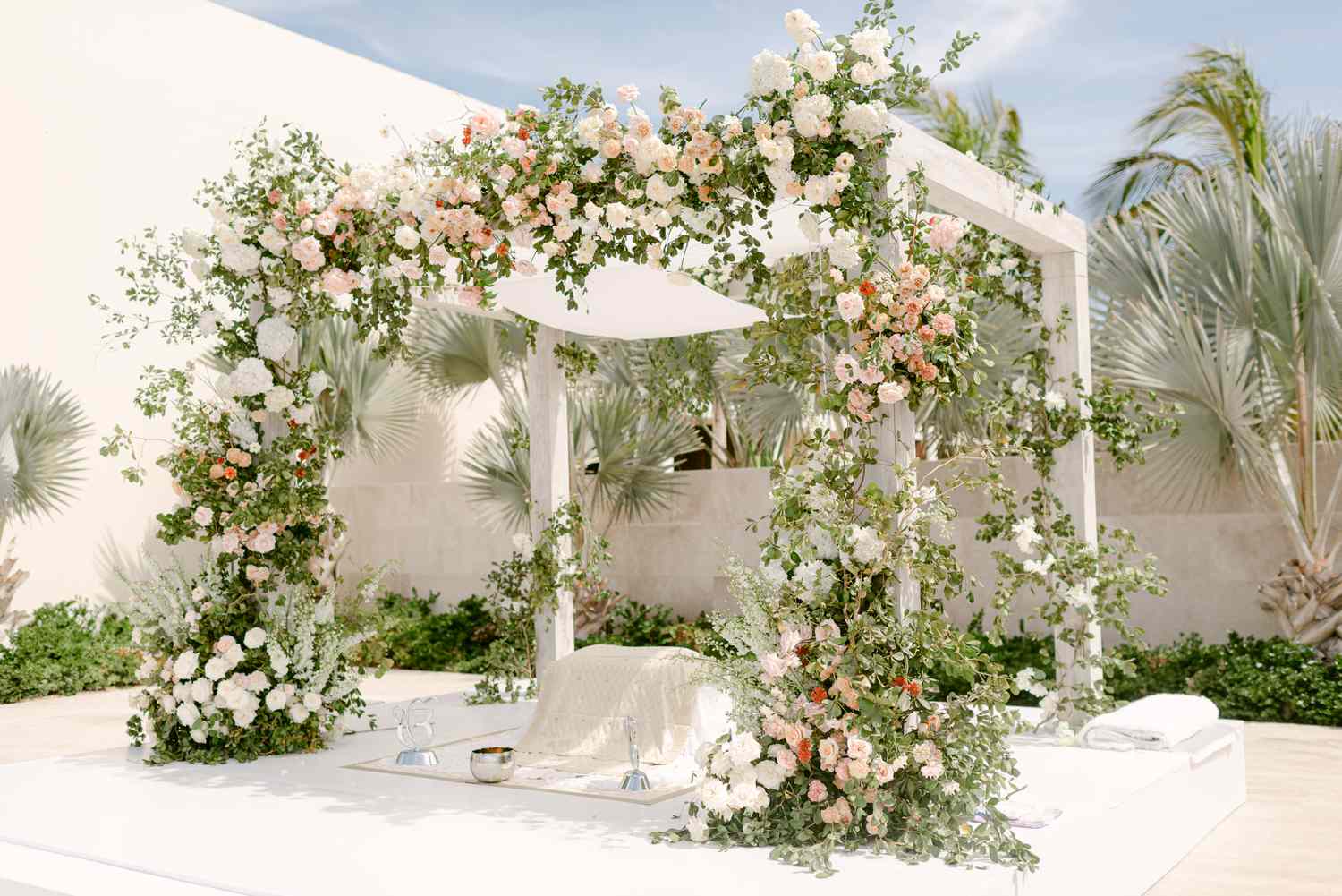 wedding mandap decorated with pastel florals