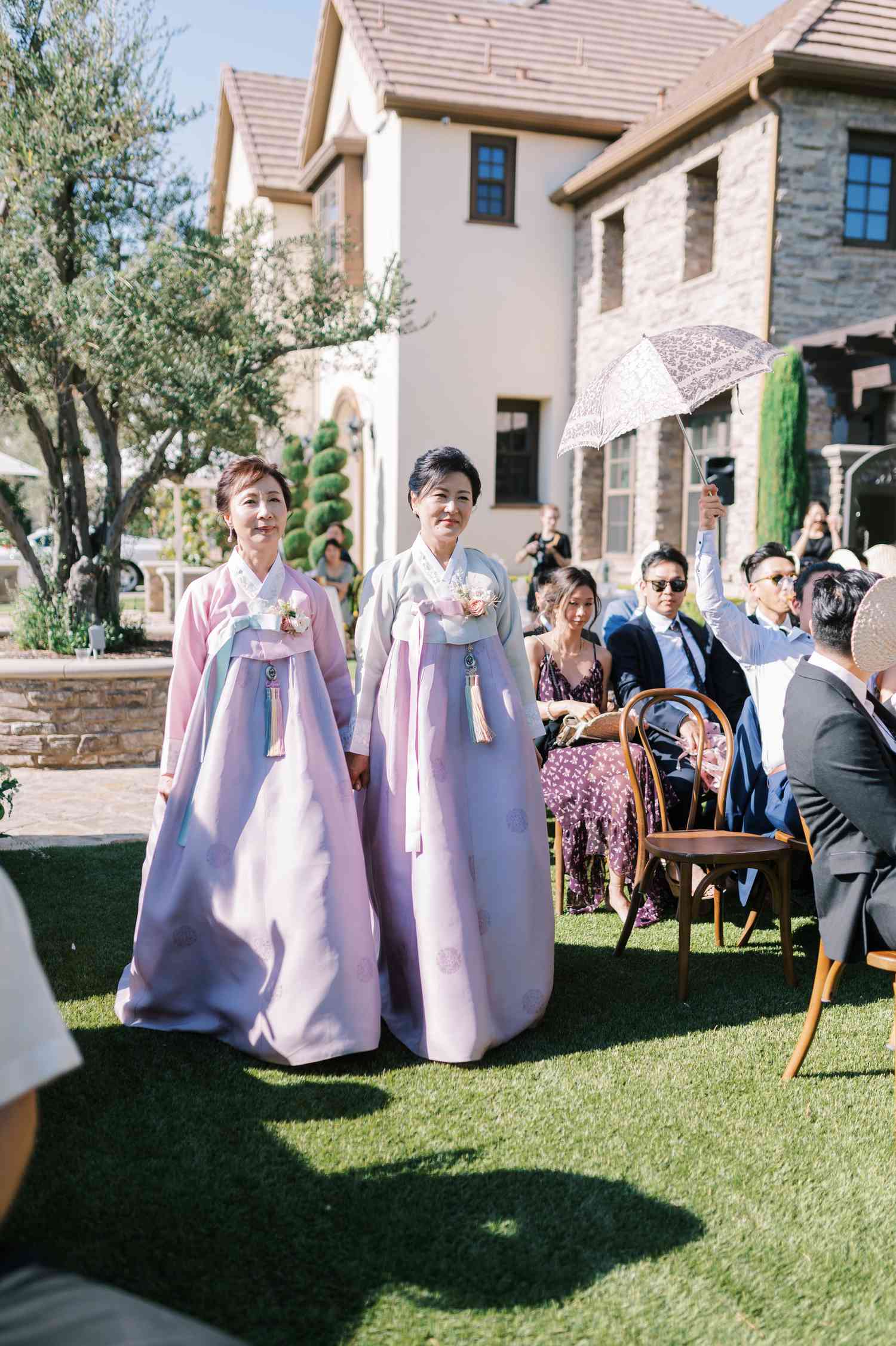 Processional of Korean mother of the bride and mother of the groom in hanbok