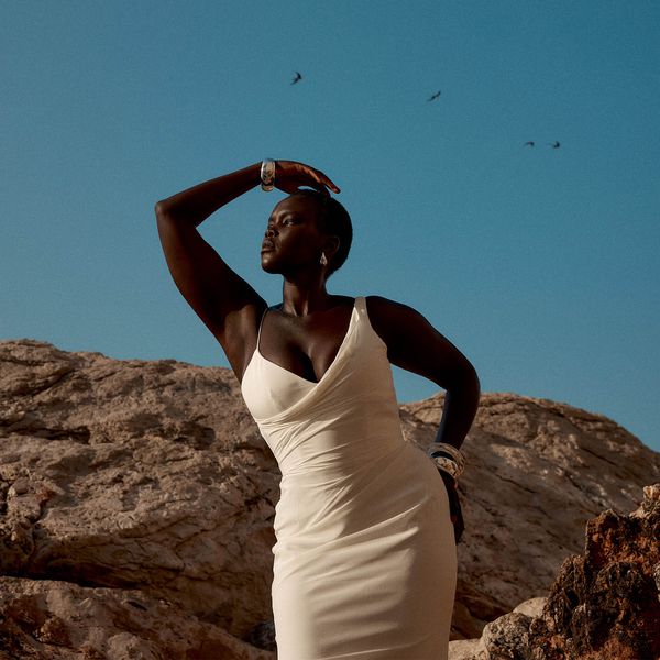 KYHA Studios model wearing a spaghetti strap dress