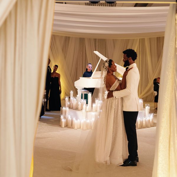 Bride and Groom Dance at Their Wedding to a Song With Love Quotes for Her