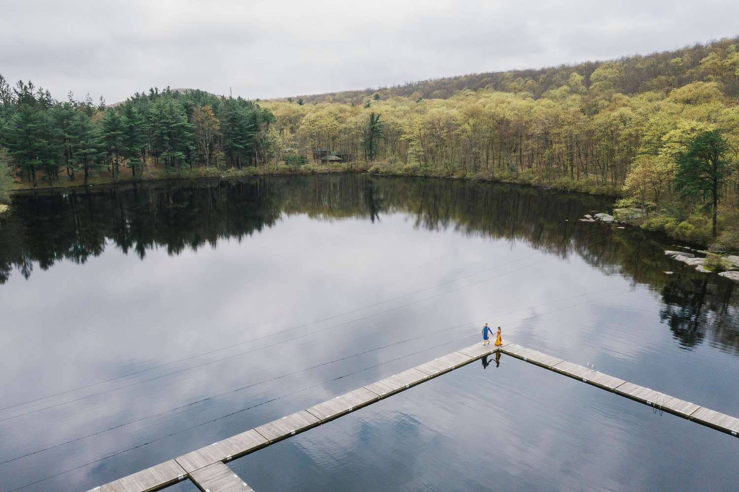 Aerial portrait of the couple by the lake