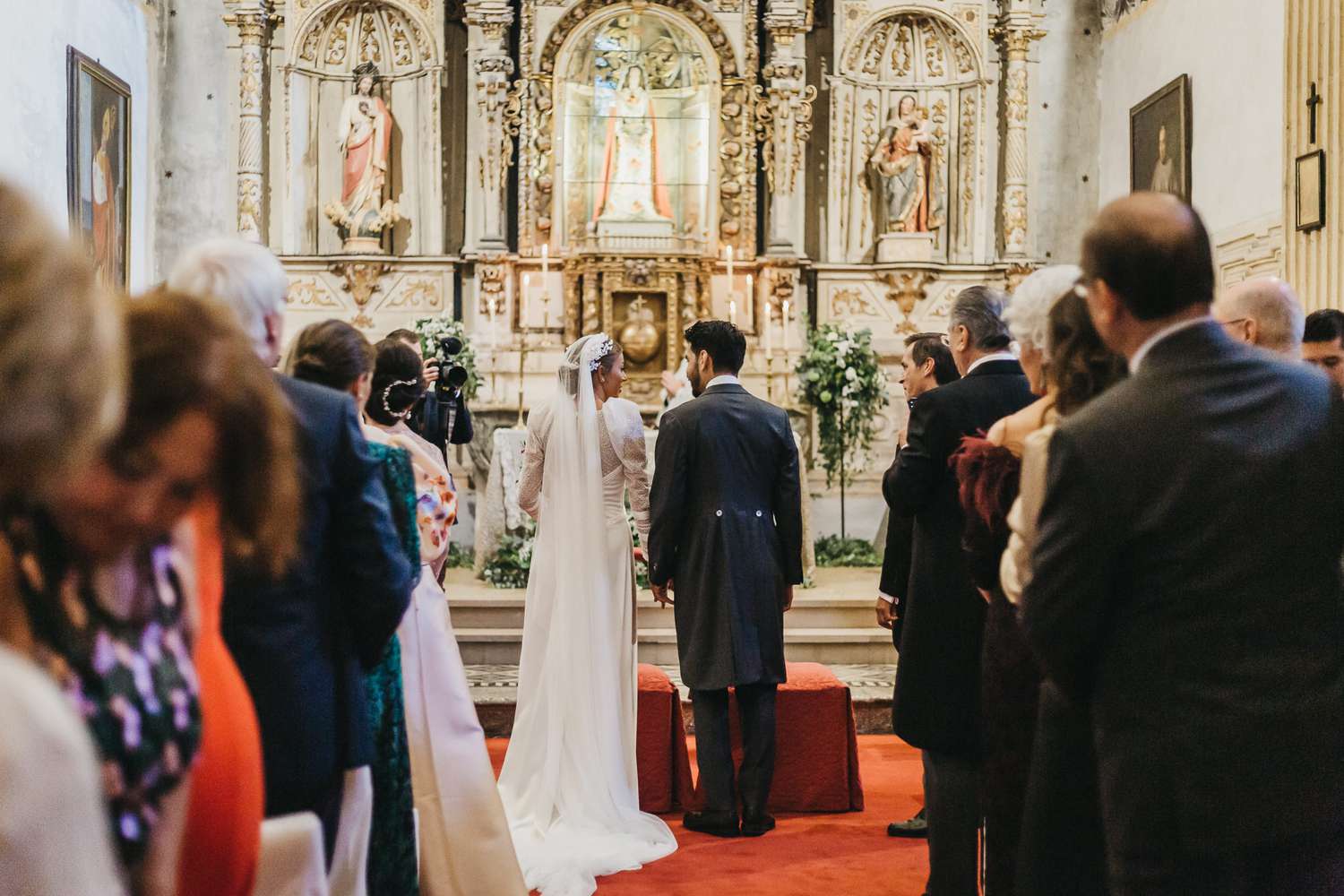 Bride and groom in church for Catholic wedding