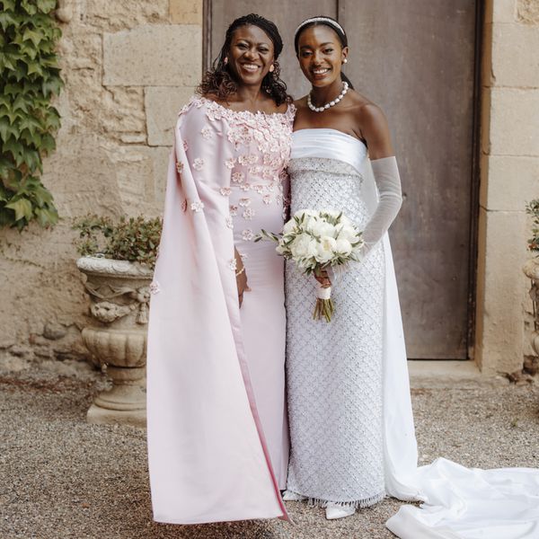 bride and her mother posing for a wedding portrait