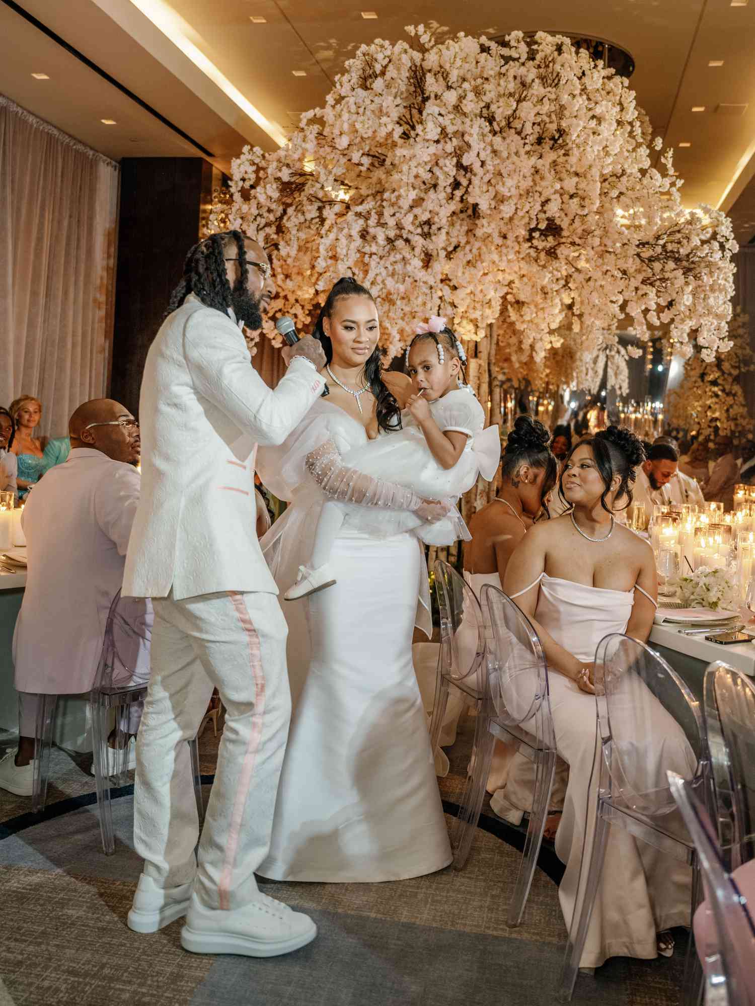 Bride and Groom Make a Wedding Speech to Their Guests With the Groom's Young Daughter