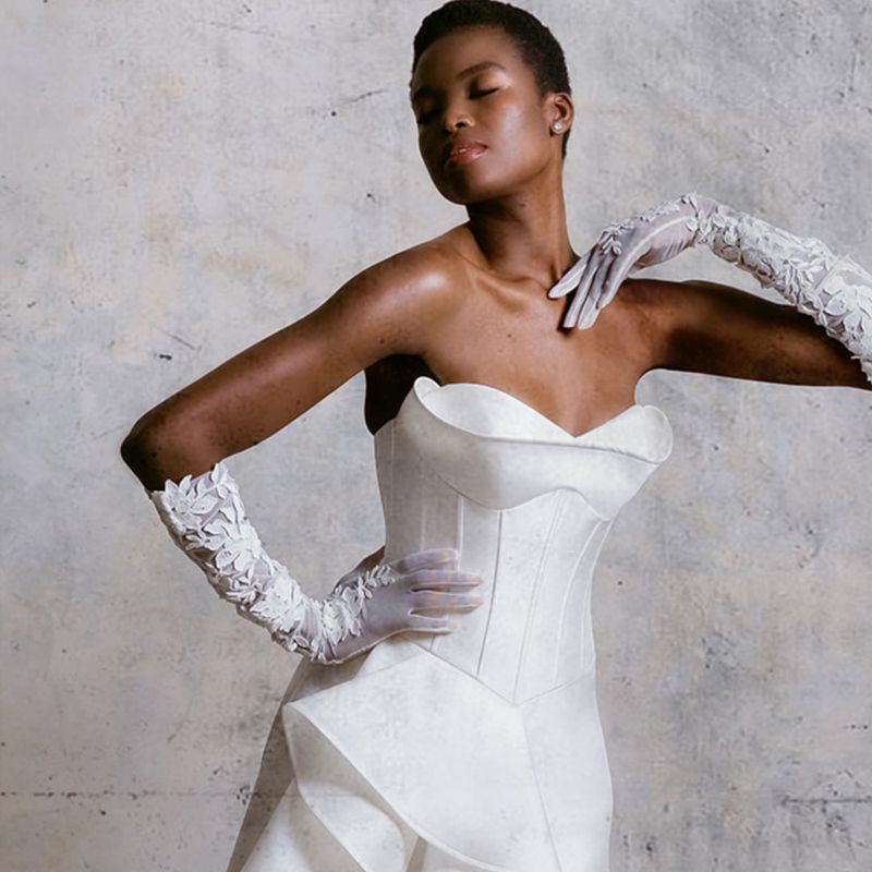 Ruffled White Wedding Dress With Strapless Corset Top and White Lace Gloves