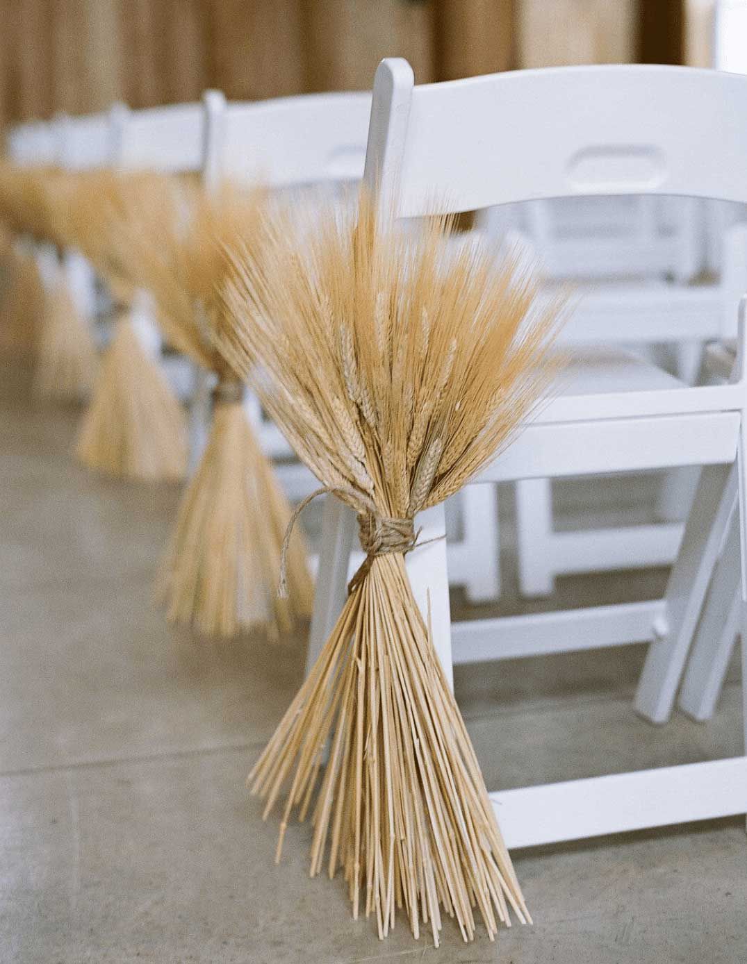 Wheat aisle runners at rustic wedding