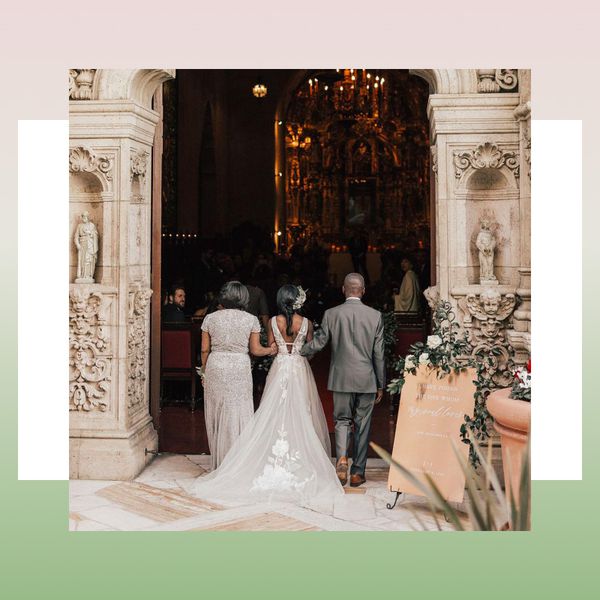 Bride entering church with mother and father