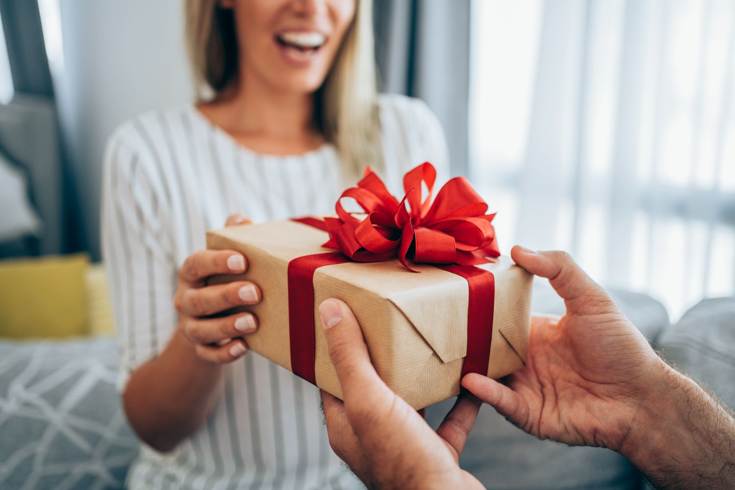 Man giving woman a gift