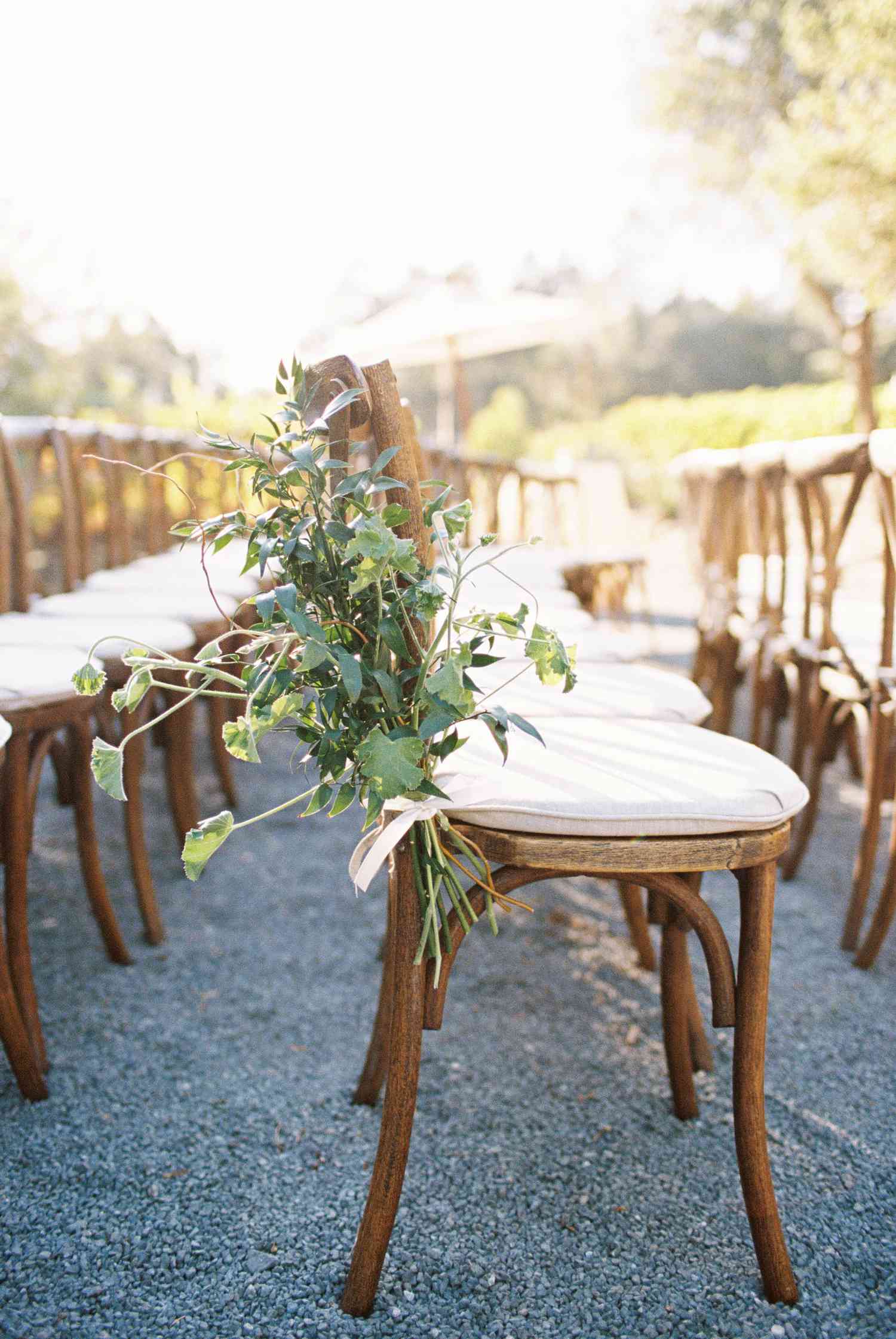 Greenery bouquets as Chair Aisle Décor