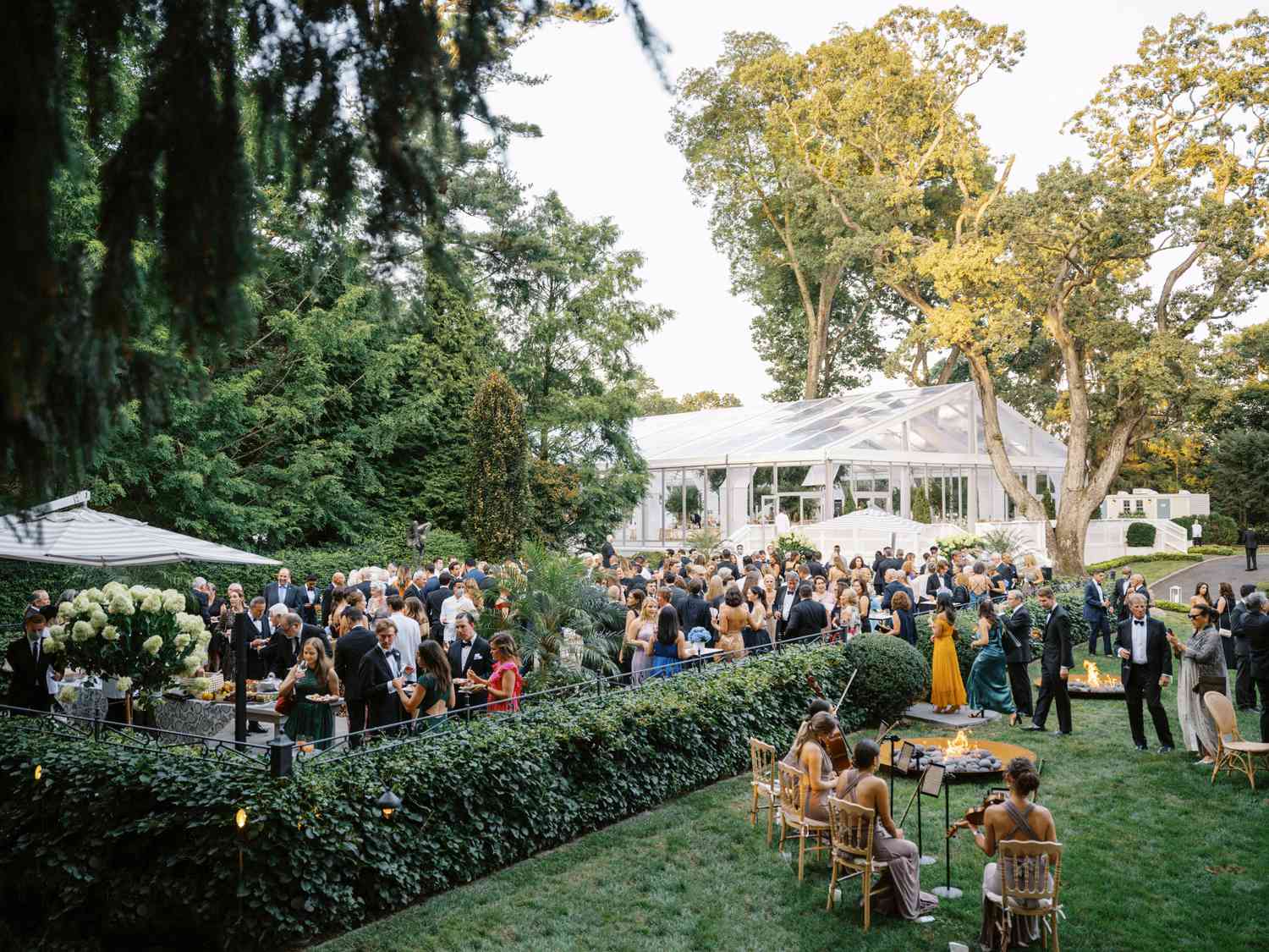 guests enjoy a garden cocktail hour