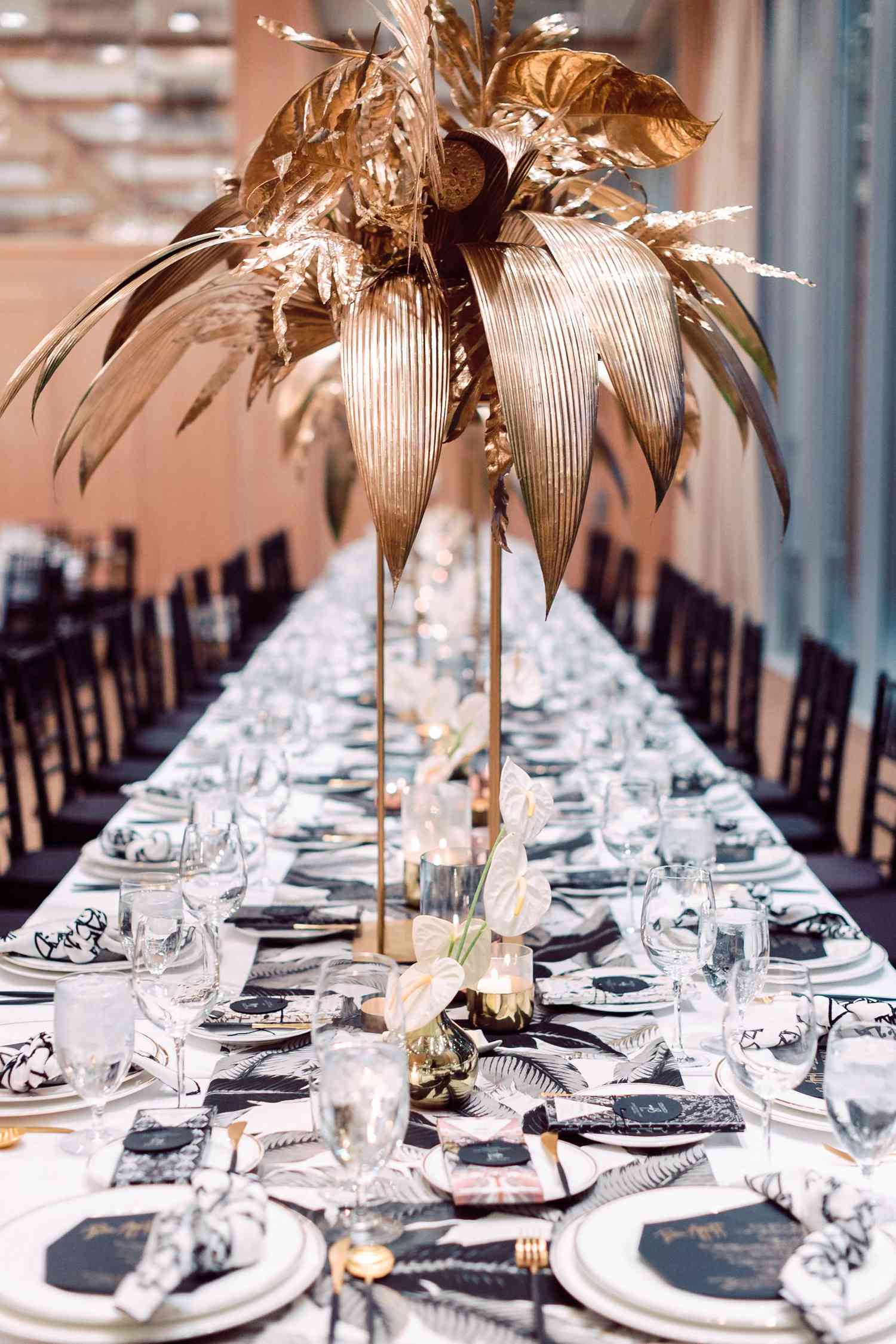 tropical modern reception table runner with gold palm leaves