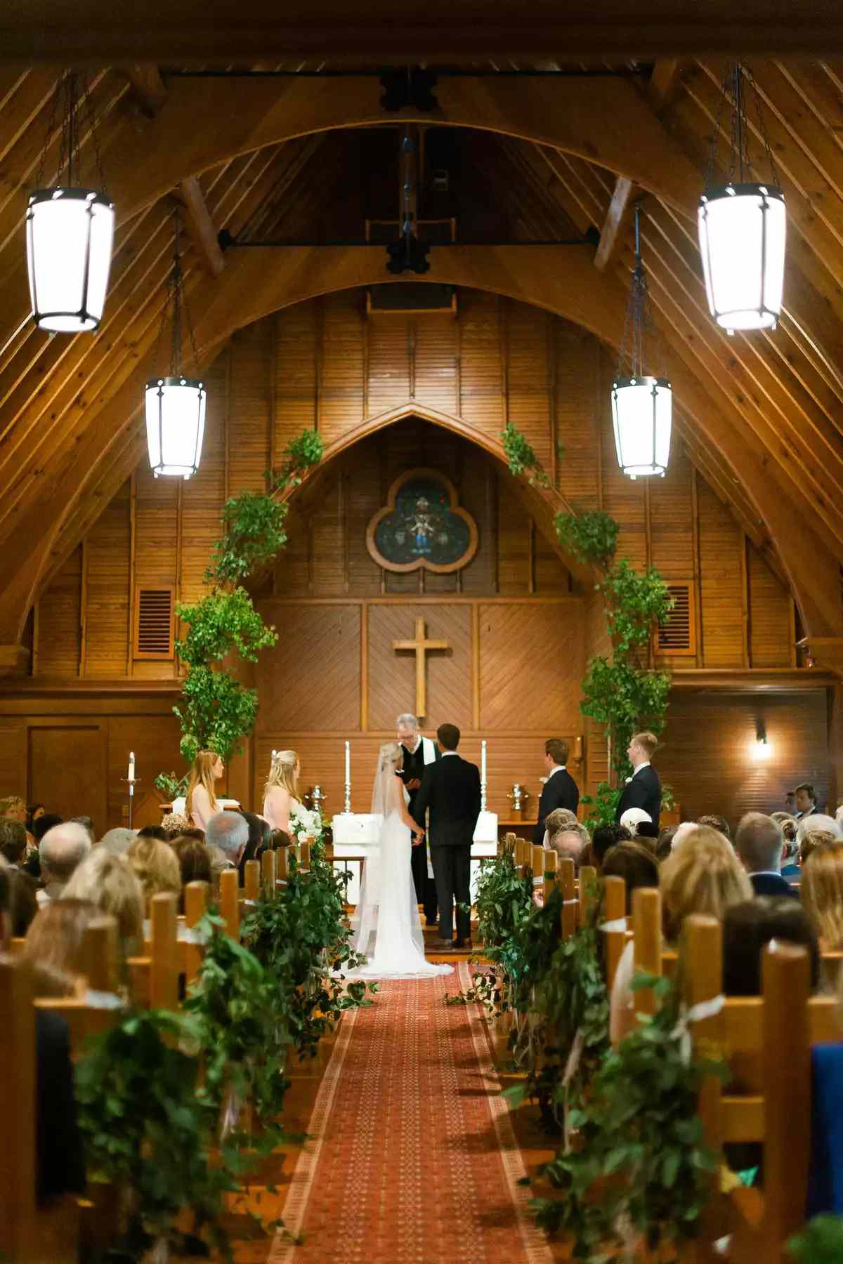 wood-toned church with greenery