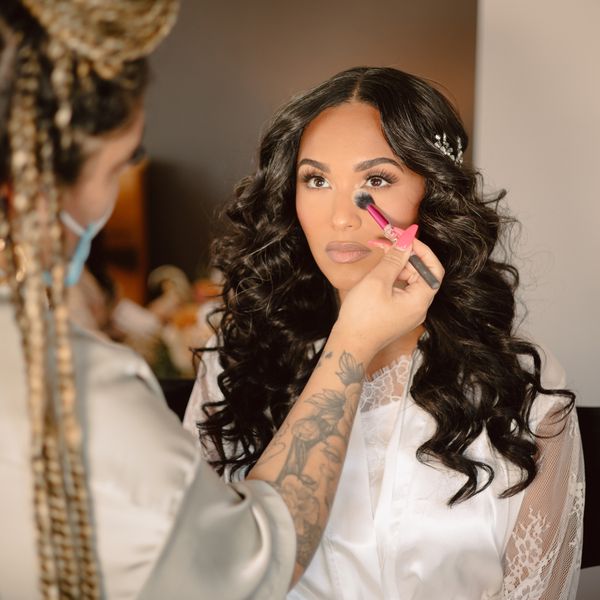 bride getting her makeup done
