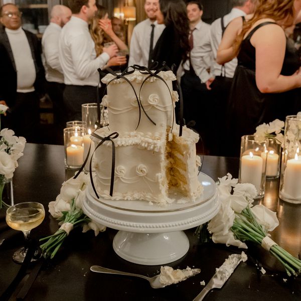 Heart-Shaped Vanilla Wedding Cake With Bows