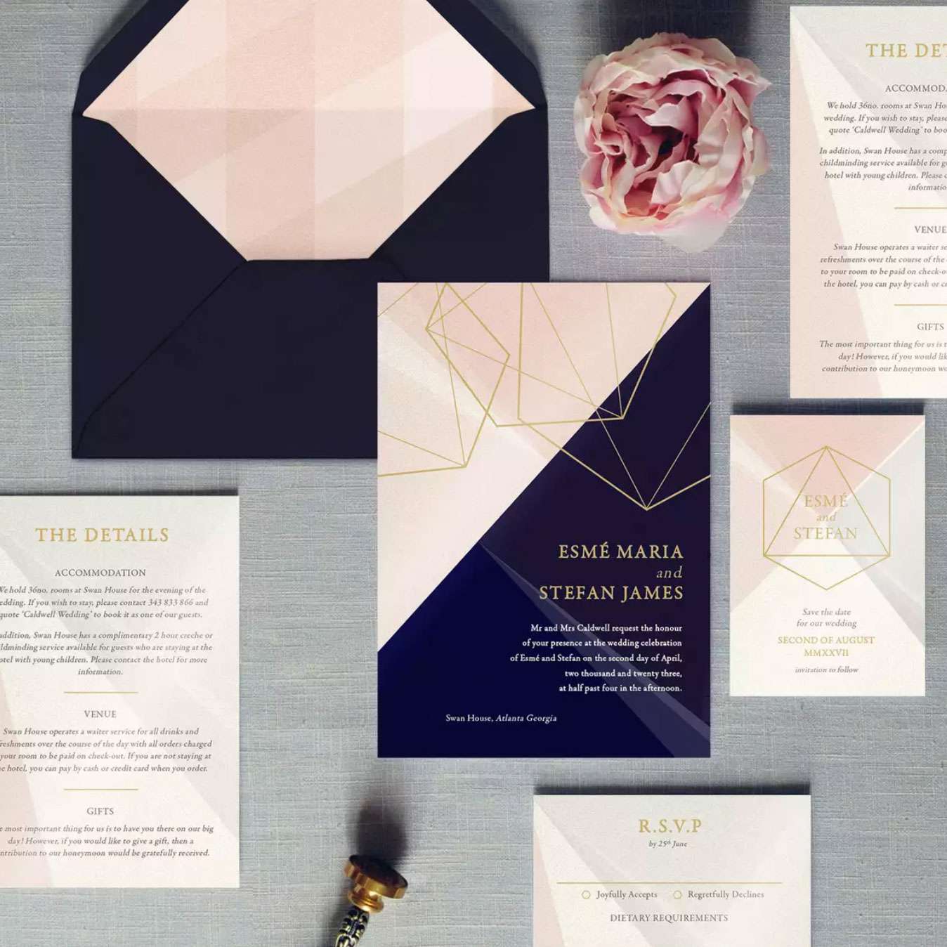 A foil wedding invitation suite.