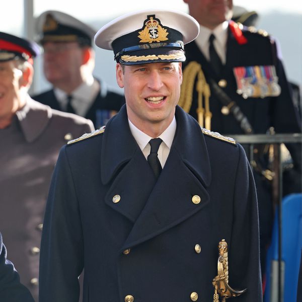 Prince William smiling in his royal navy uniform