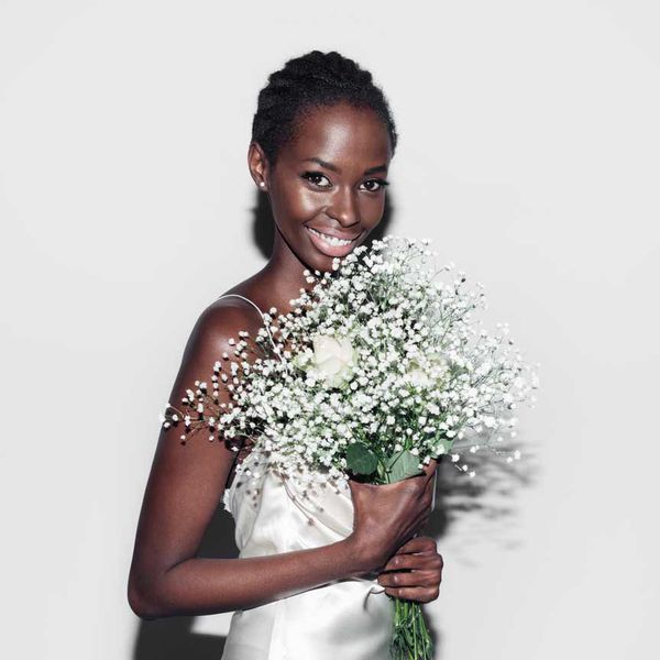 Bride holding a baby's breath bouquet