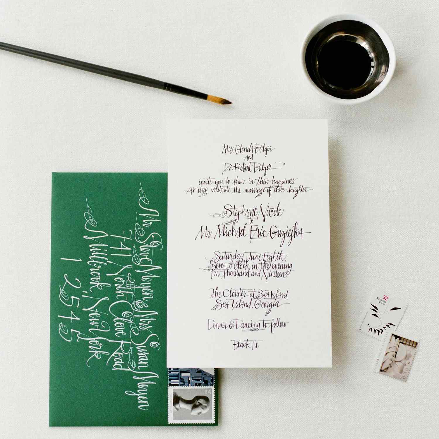 calligraphy wedding invitation and ink with brush