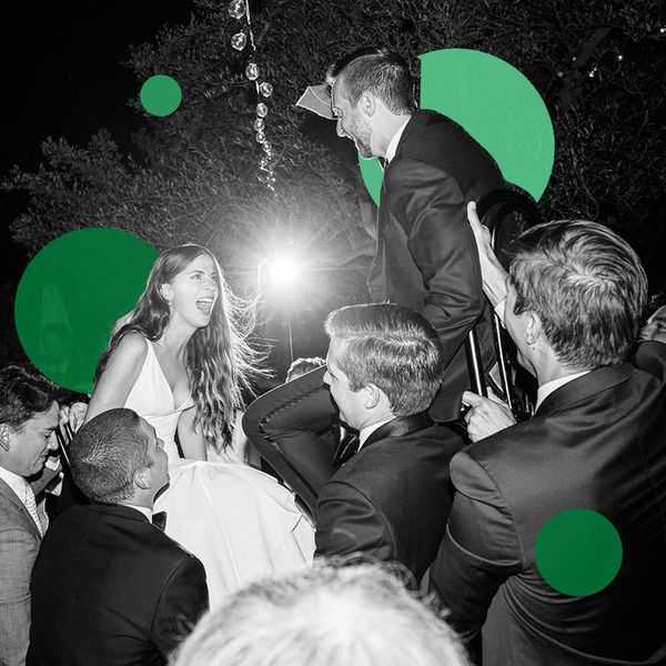 bride and groom doing the horah