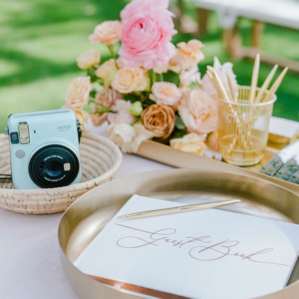 Close Up of Guest Book and Polaroid Camera
