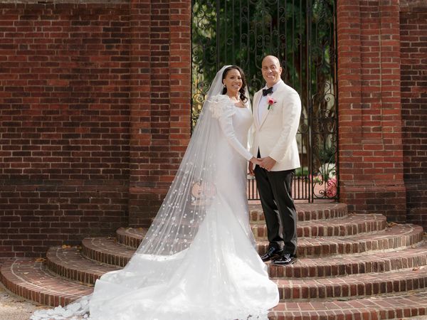 Wedding Couple in Front of Iron Gate