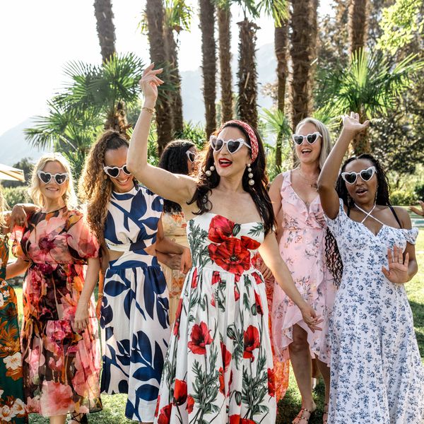 Wedding Guests in Colorful Attire and Heart-Shaped Sunglasses