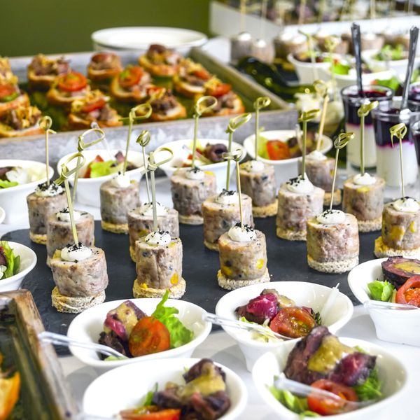 Food Bar With Salads, Tuna Tartare, Parfaits, and Bruschetta at Wedding