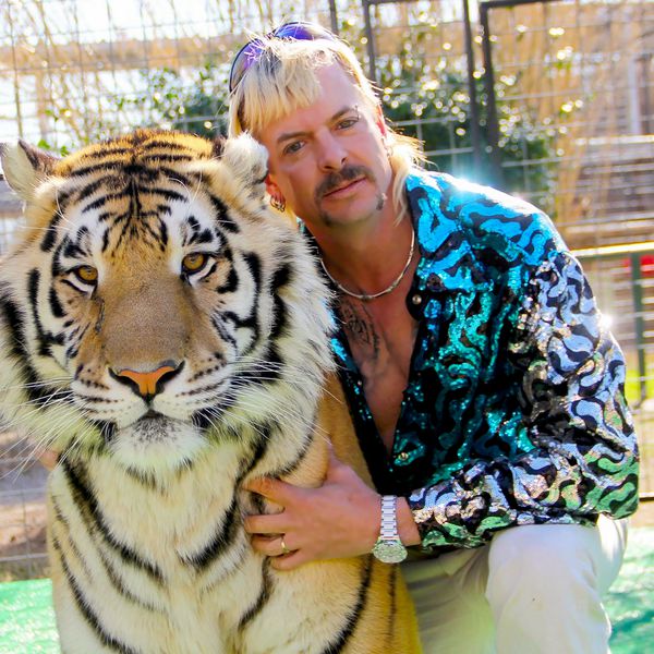 Tiger King's Joe Exotic in Sequined Jacket Posing With Tiger