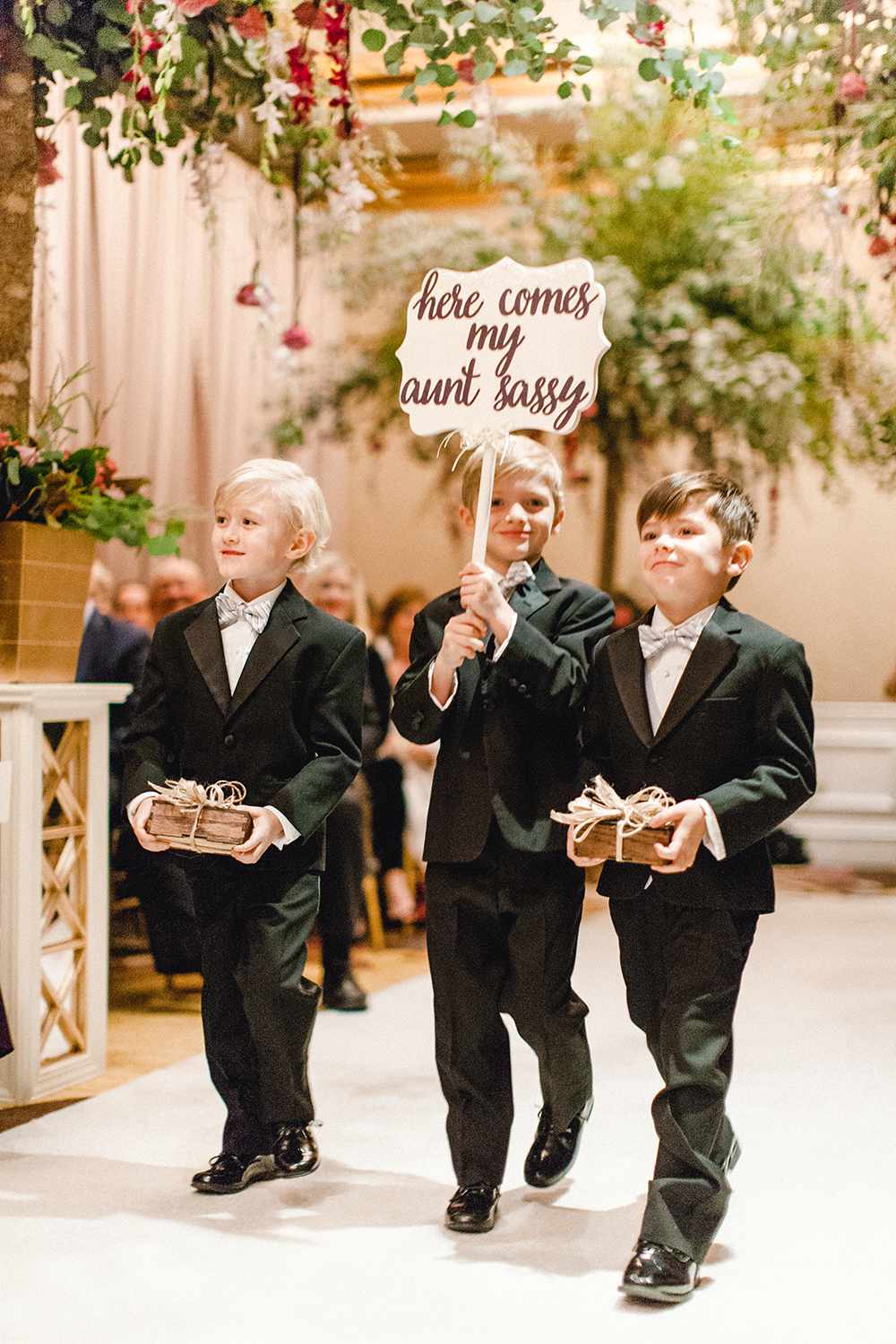 Ring Bearers Holding Books and Scalloped Sign