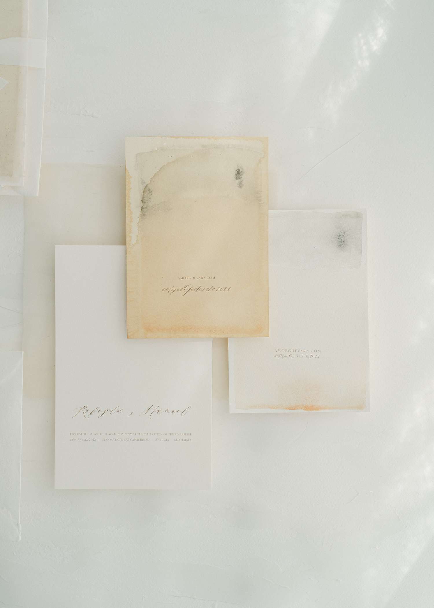 invitation suite with watercolor background and minimal font