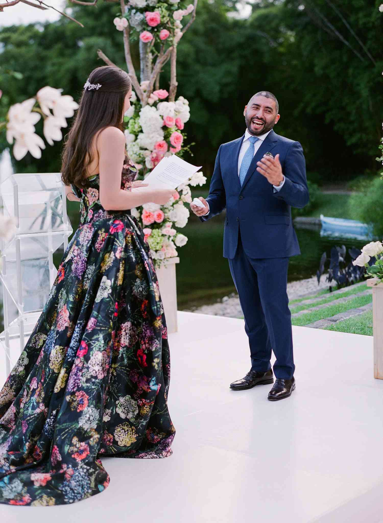 Sarah reading personal vows to Carlos