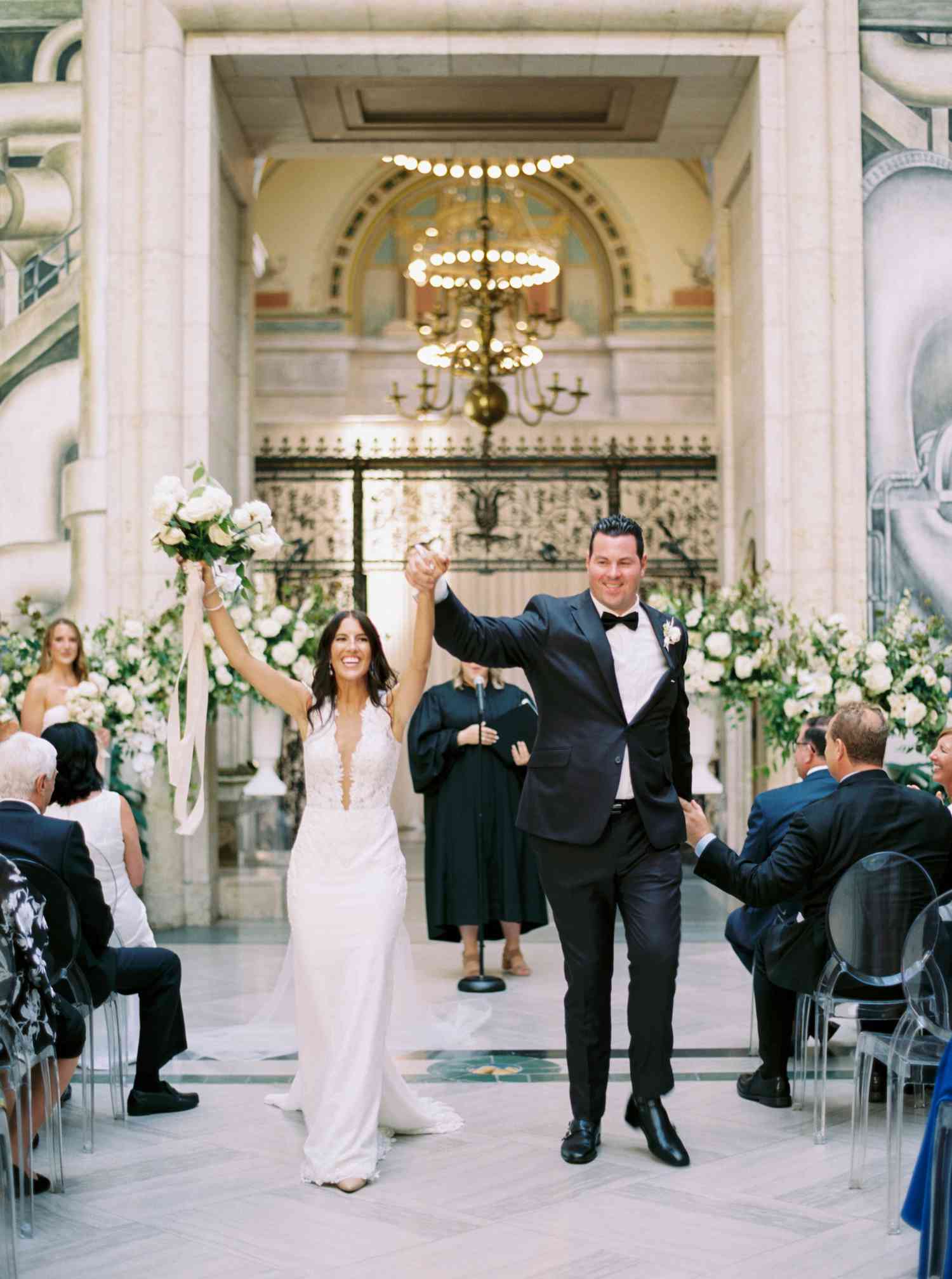 The couple recess down the aisle