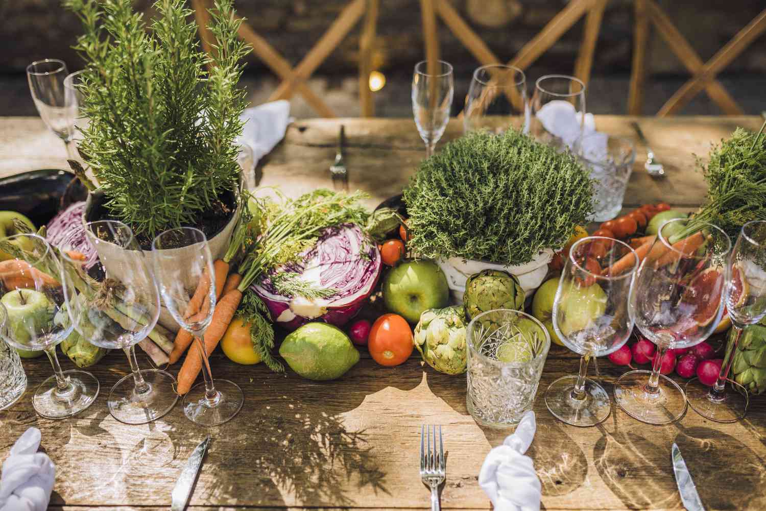 Sofia and Jose's tables lined with fruit accents and potted greenery