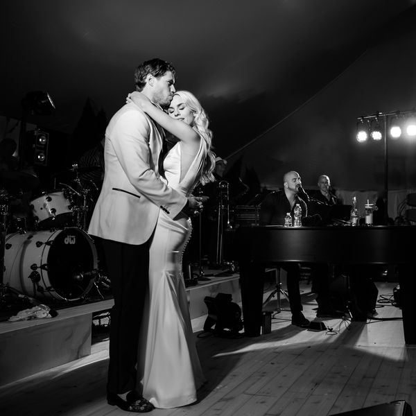 Couple slow dancing to acoustic music