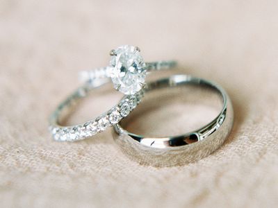 silver wedding rings: a diamond wedding bad, a metal wedding band, a diamond engagement ring