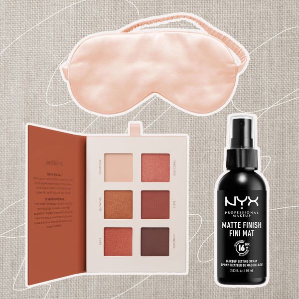 Several items to pack for a summer wedding on a beige textile background