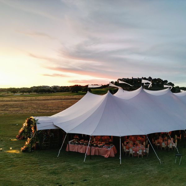 Tent Wedding in Texas Against a Sunset
