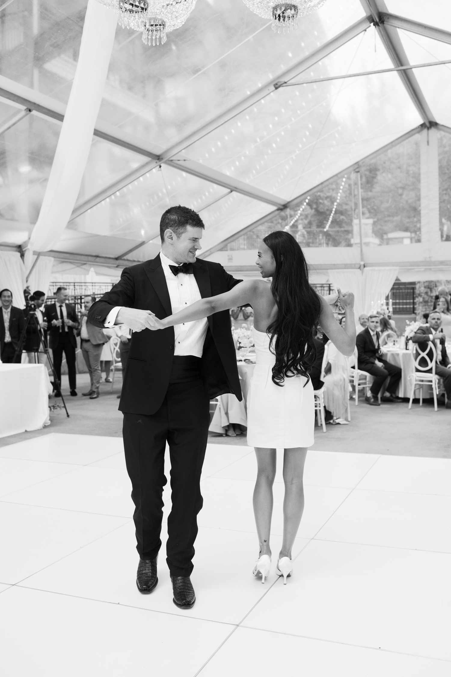A Bride and Groom Share a Dance Following Their Wedding Entrance