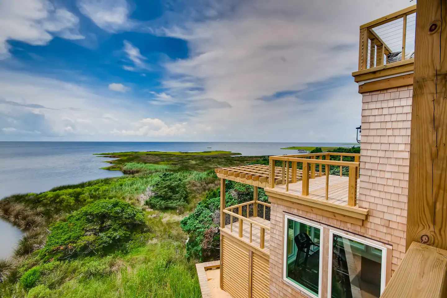North Carolina Airbnb wedding venue overlooking marshland and the ocean.