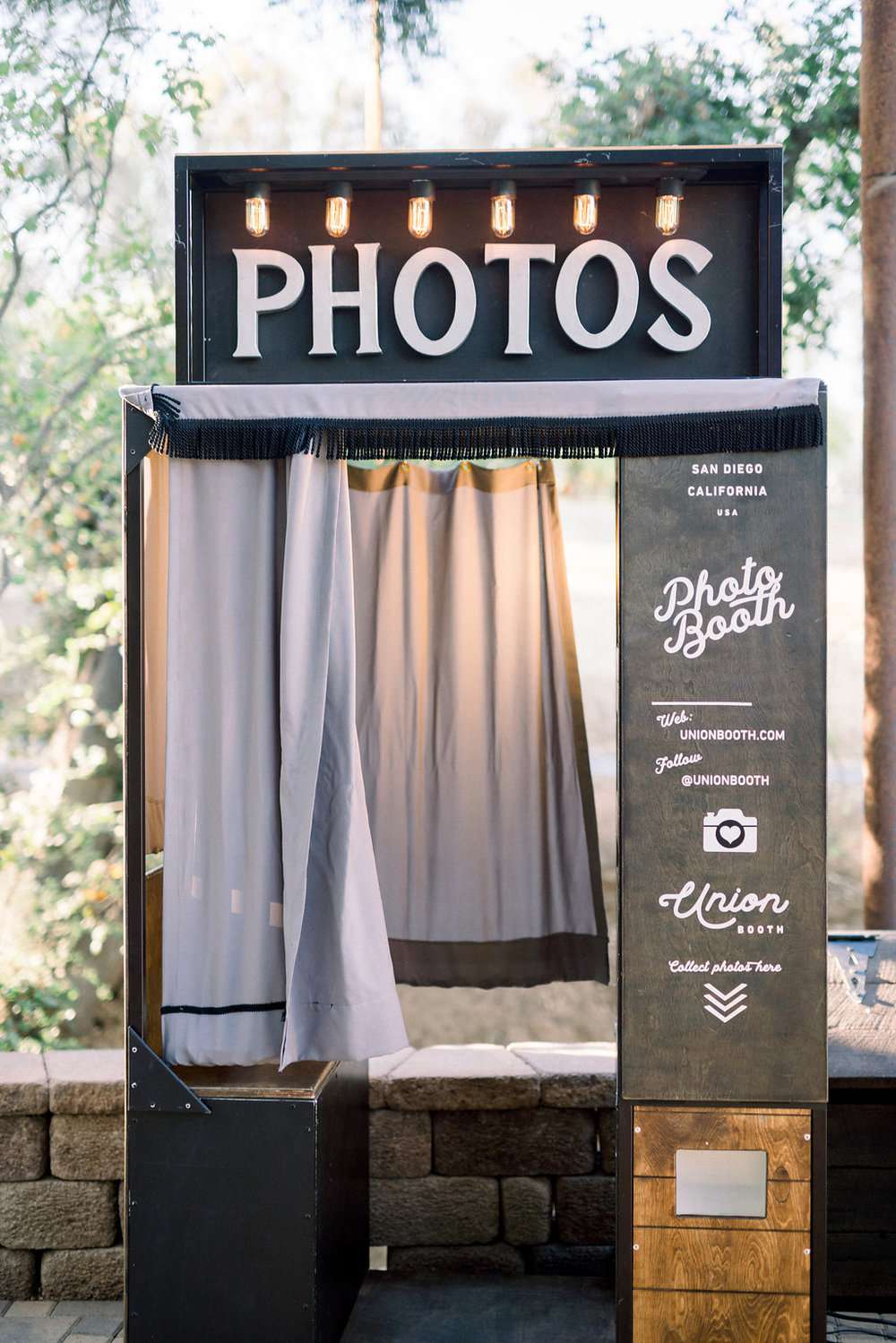 Kenwood Booth with privacy drapes and large sign