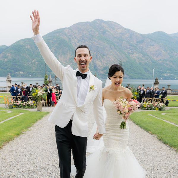 Couple celebrating during the recessional after getting married