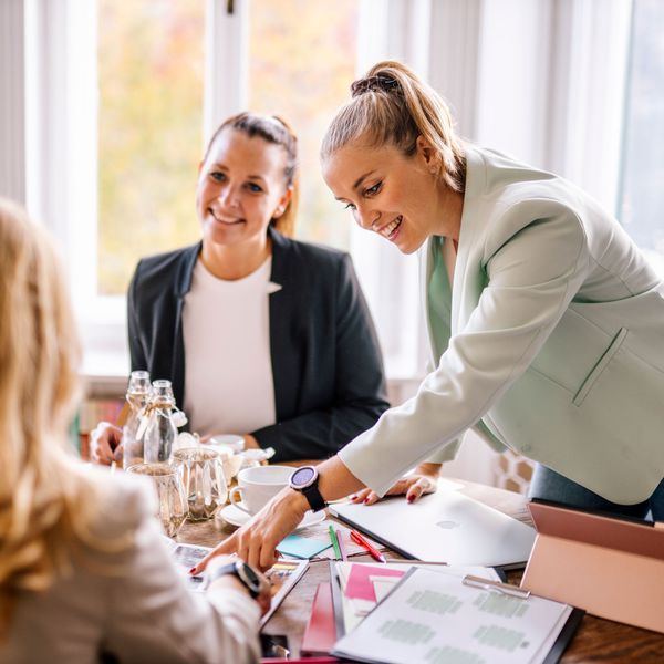 Wedding Planner and Wedding Coordinator Go Over the Details for a Bride's Big Day
