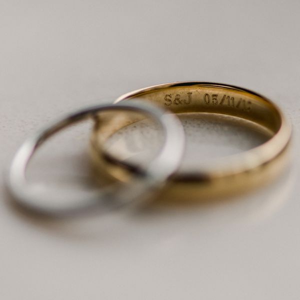 silver and gold wedding bands with custom engraving