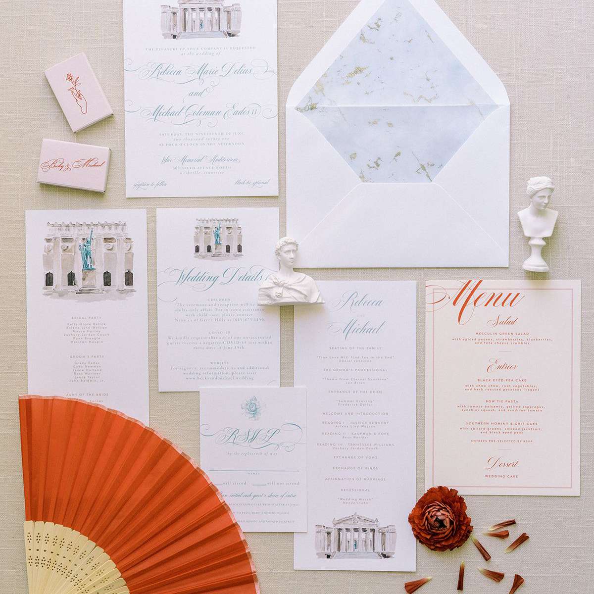 flat lay image of european-inspired wedding stationery