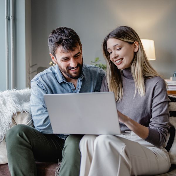 Young couple on their laptop