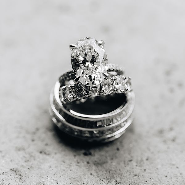 wedding rings stacked on top of each other