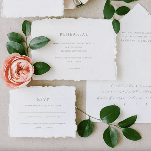rehearsal dinner invitation and RSVP card on deckle-edge paper