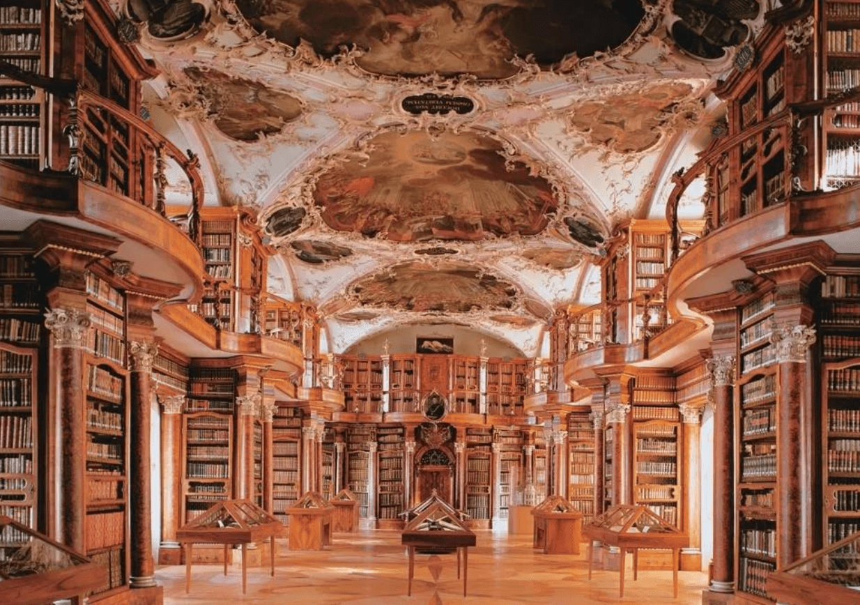 Interior view of wooden shelves and books at Abbey Library of Saint Gall in St. Gallen, Switzerland.