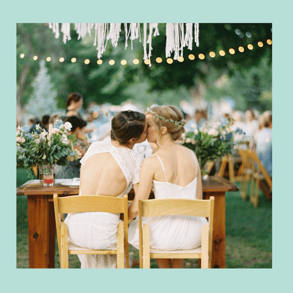 brides kissing